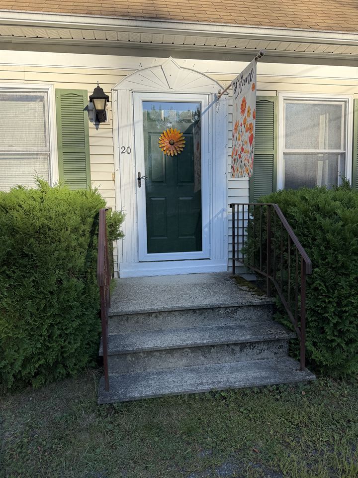 Front entry steps darkened with grime
