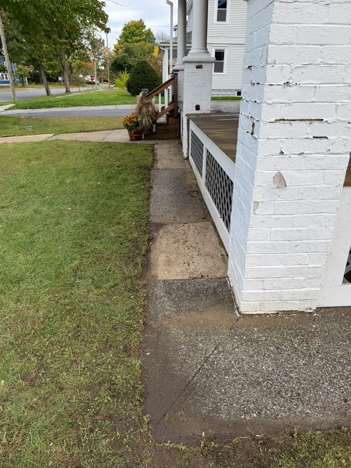 The same porch corner walkway after washing